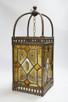 An Edwardian stained glass and brass mounted hall lantern, 53cm high