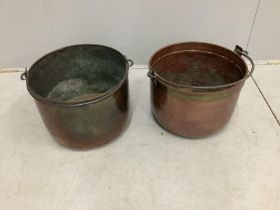 Two Victorian copper and brass cauldrons with iron swing handles, larger diameter 44cm, height 33cm