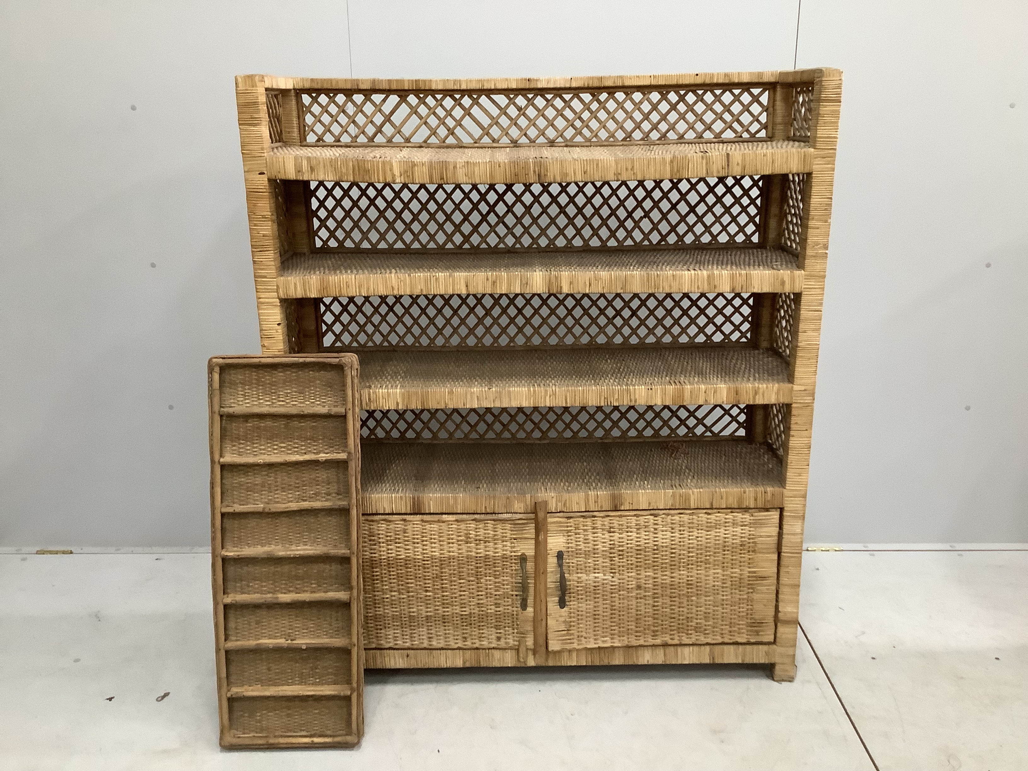 A wicker four tier shelf unit, width 121cm, depth 36cm, height 140cm, together with a wicker eight