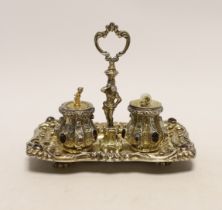 A 19th century Austrian embossed gilt white metal and multi gem set rectangular inkstand, with