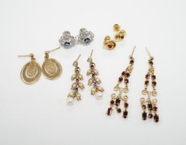 Three pairs of assorted 9ct gold earrings including two gem set, a pair of white metal (stamped