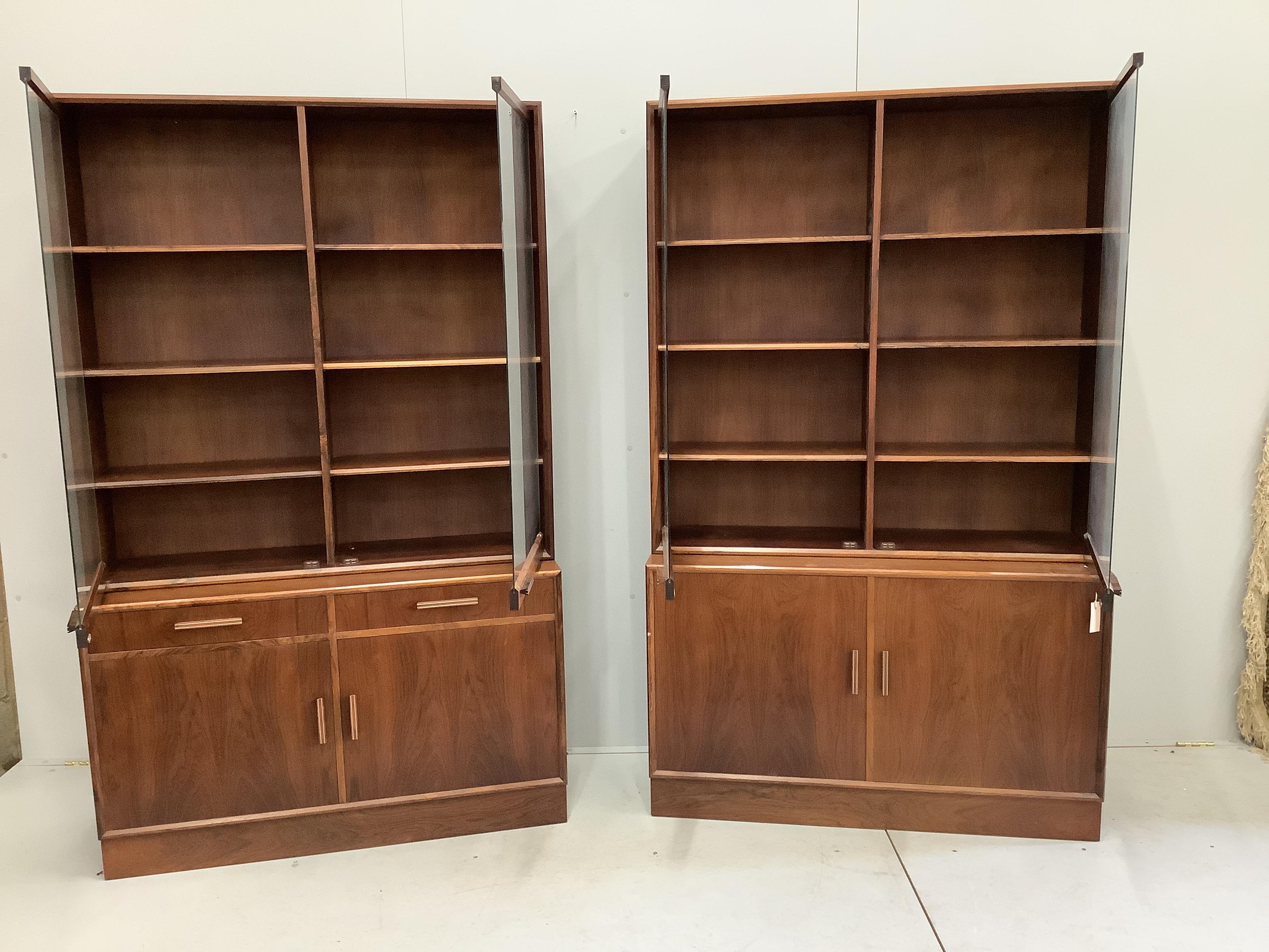 A pair of mid century Indian rosewood glazed cabinets with adjustable shelves, width 110cm, depth - Image 2 of 3