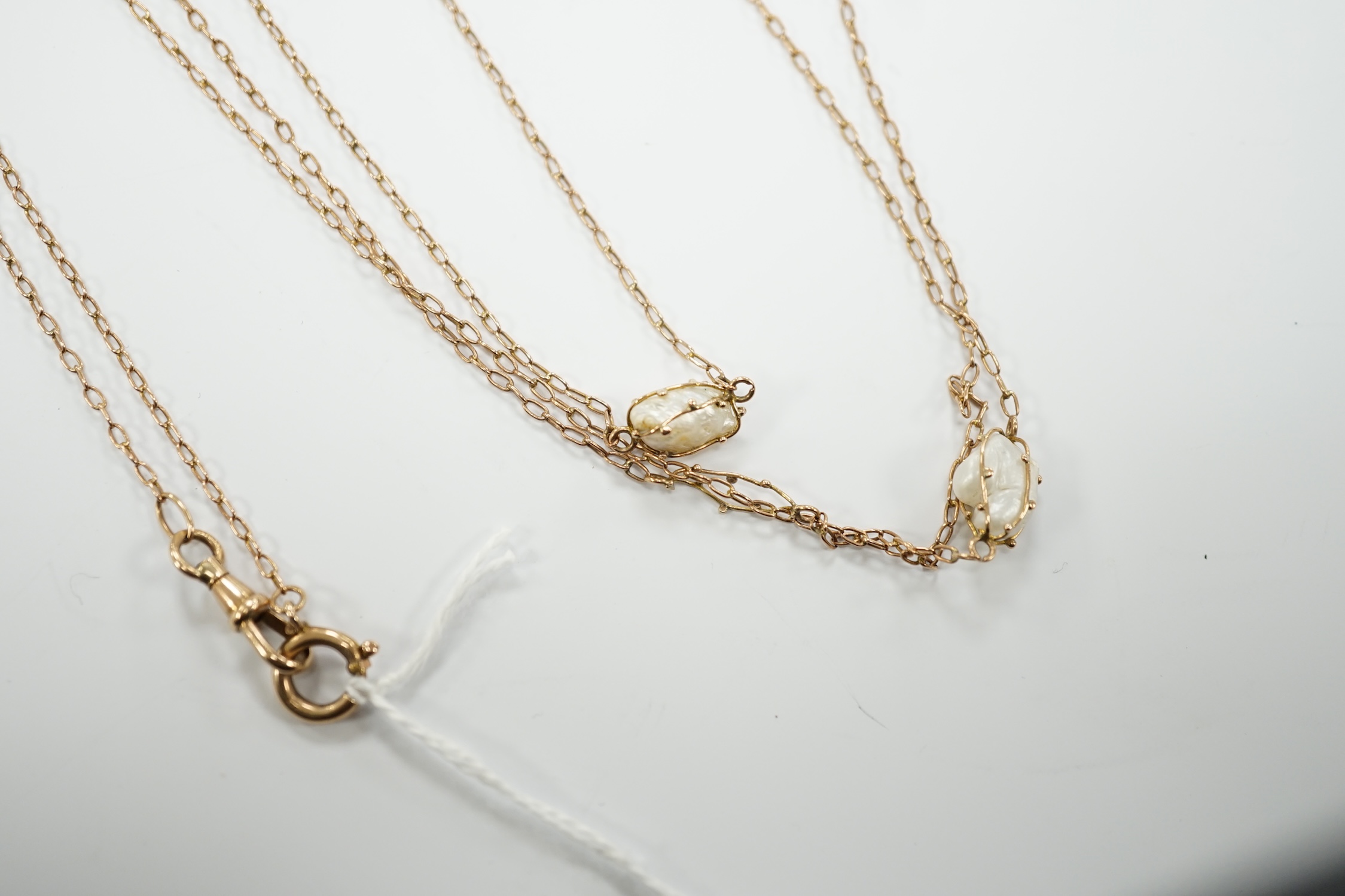 An early 20th century 9ct and eleven stone baroque pearl set long chain, 160cm, gross 13.2 grams. - Image 5 of 5