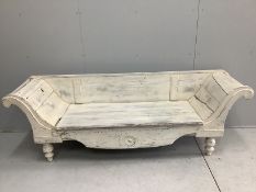 A Continental painted settle, width 220cm, depth 56cm, height 72cm