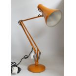 A Herbert Terry orange anglepoise lamp, highest height 89cm