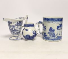A Chinese blue and white mug and two jugs, 18th/19th century, largest 14cm high (3)