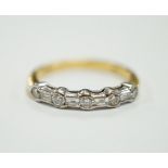 A modern 18ct gold, round and baguette cut diamond set half hoop ring, size N/O, gross weight 3.2