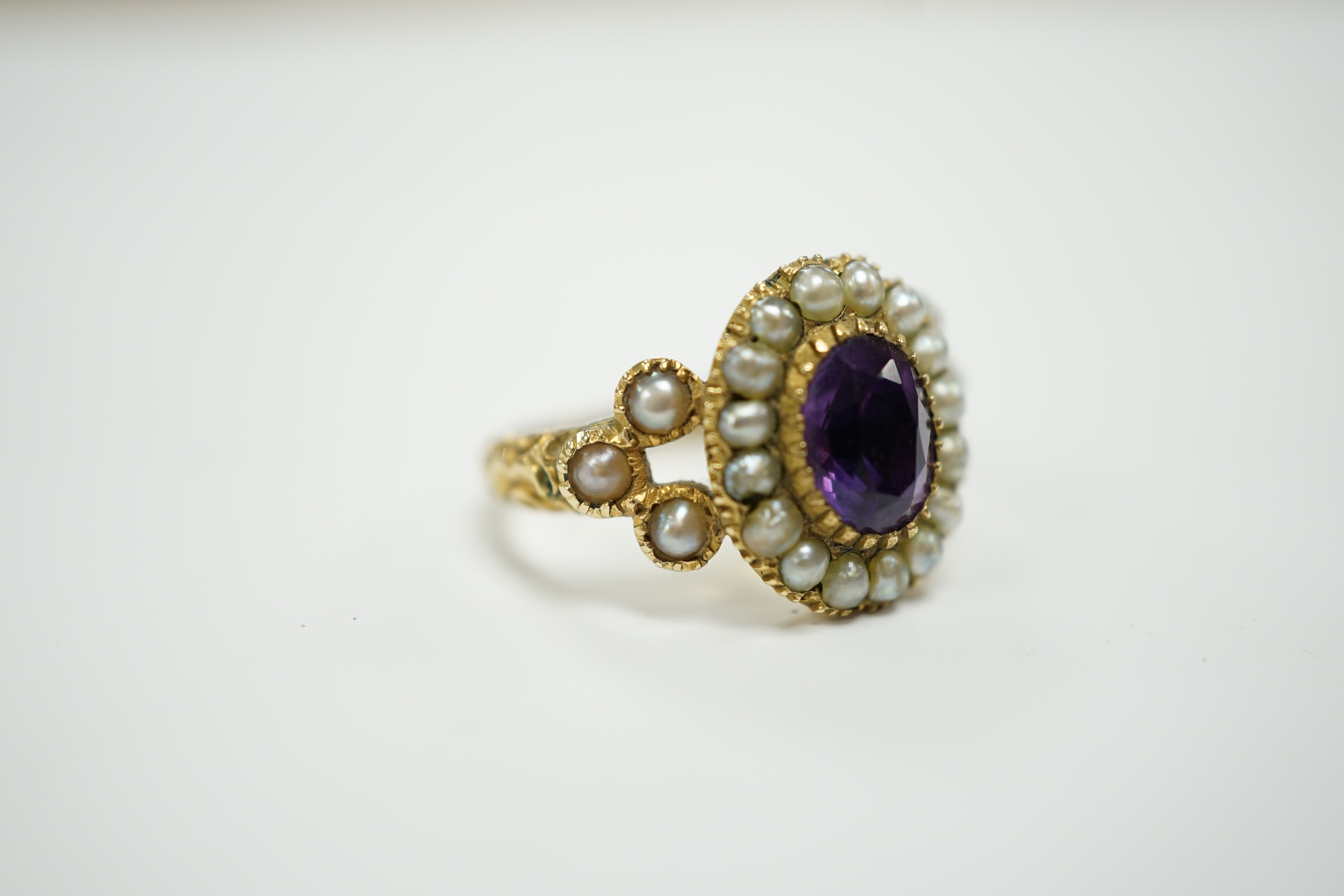 A Victorian yellow metal seed pearl and amethyst set oval cluster ring, size L, gross weight 3.7 - Image 3 of 4