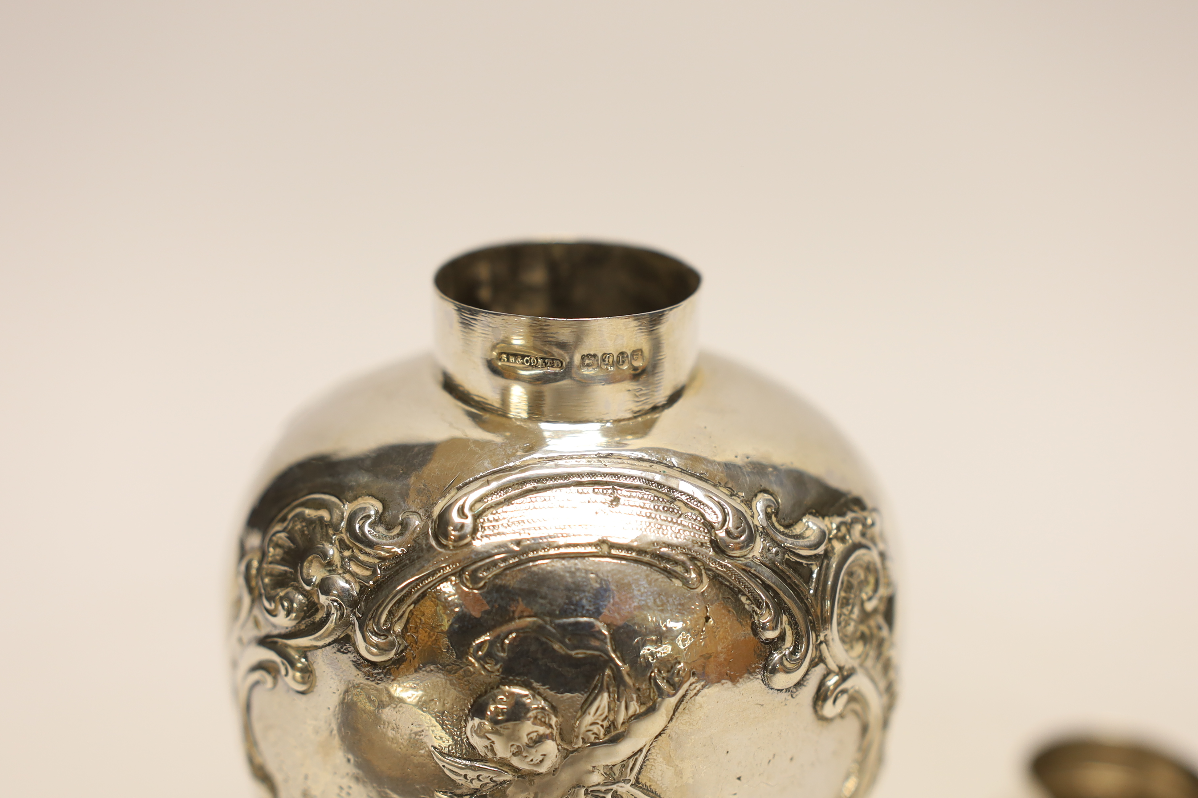 An Edwardian continental embossed silver tea caddy? and cover decorated with amorini, makers stamp - Image 3 of 3