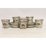 A set of six early 18th century Chinese cups and saucers with Dutch enamelled decoration, c.1710,