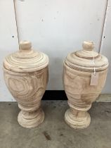 A pair of modern turned wood lidded urns, height 55cm
