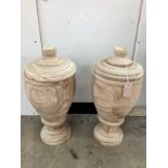 A pair of modern turned wood lidded urns, height 55cm