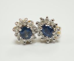 A pair of yellow metal, sapphire and diamond set oval cluster ear studs, 7mm, gross weight 1.3