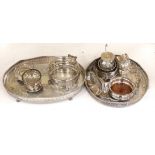 A quantity of silver plate including two trays with pierced galleries, a wine coaster, condiment