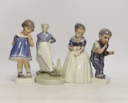 Four Royal Copenhagen figures and figurines of children, largest 19cm high