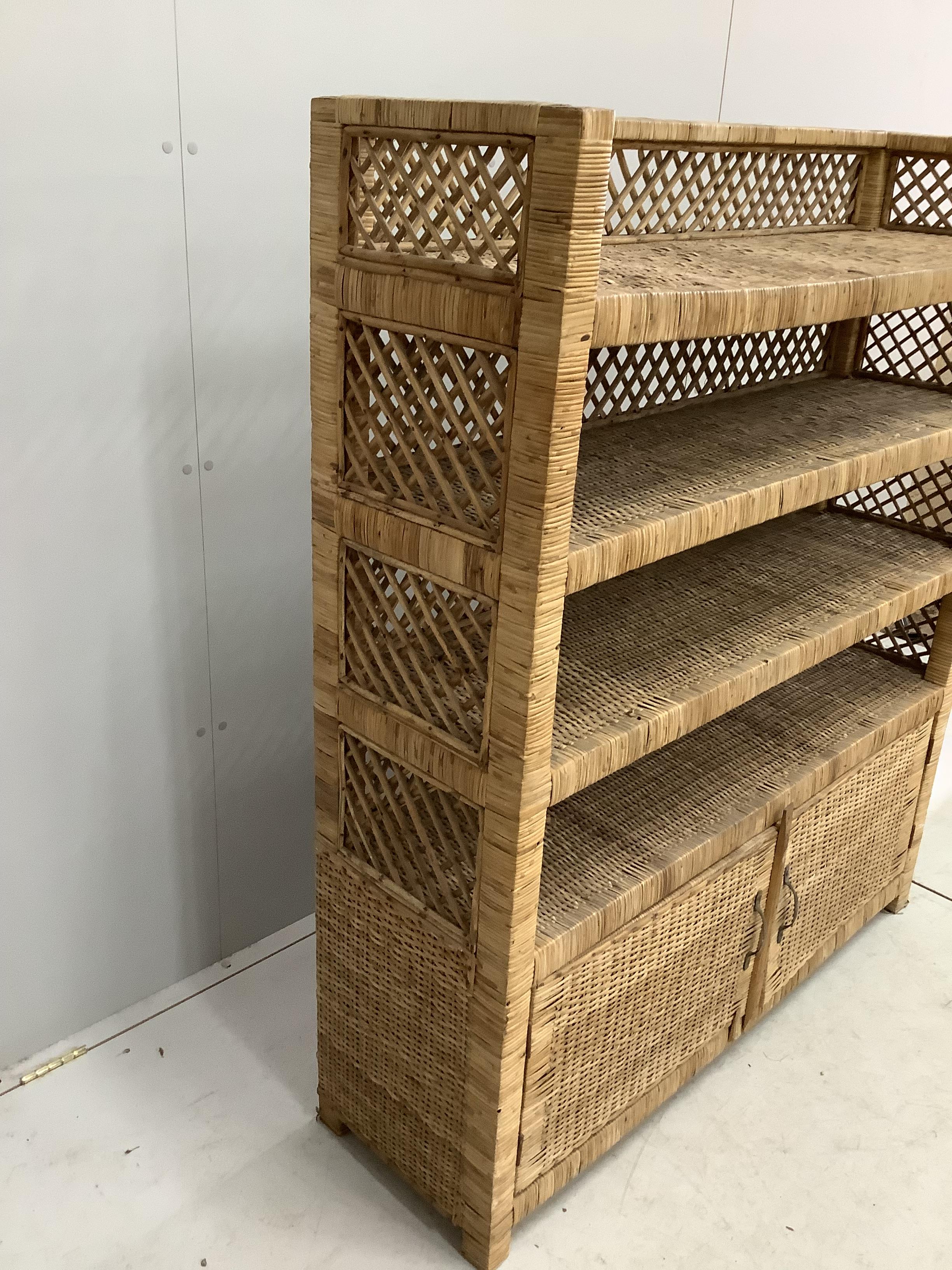 A wicker four tier shelf unit, width 121cm, depth 36cm, height 140cm, together with a wicker eight - Image 3 of 3