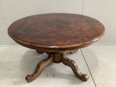 An early 20th century Continental figured walnut circular coffee table, diameter 98cm, height 57cm