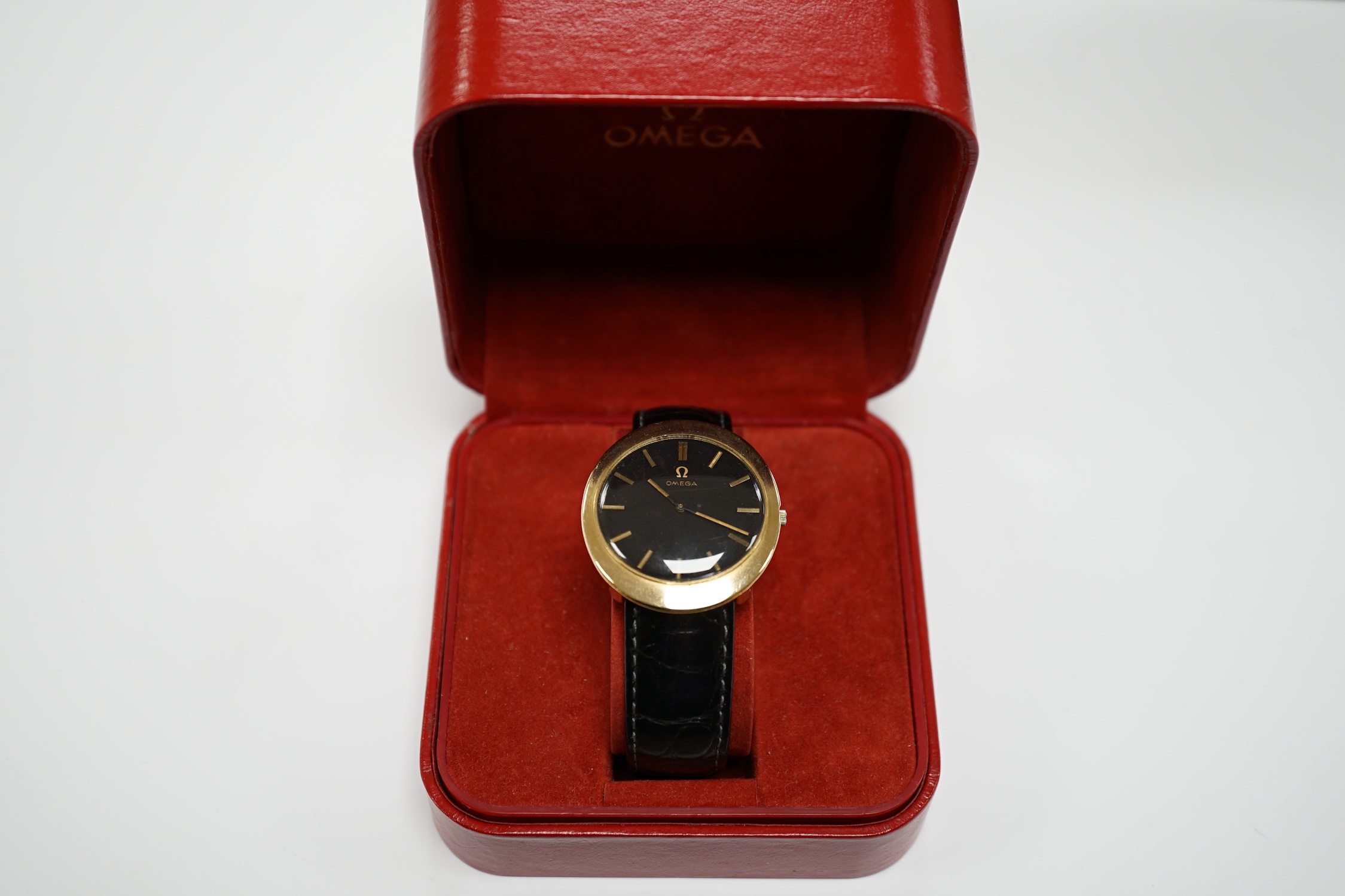 A gentleman's 9ct gold black dial manual wind wrist watch, with Omega box. - Image 7 of 9