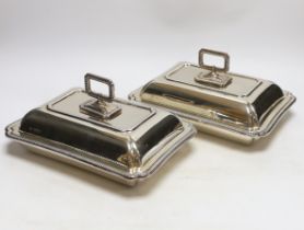 A pair of George V silver rectangular entrée dishes with covers and handles, by George Howson,