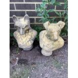 Two cast stone garden busts of a fox and a terrier, larger height 40cm