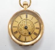A continental 14k open face keyless fob watch, with Roman dial, gross weight 34.3 grams.