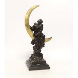 After Claire Colinet (1885-1972), a bronze study of a Pierrot and crescent moon, raised on stepped