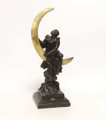 After Claire Colinet (1885-1972), a bronze study of a Pierrot and crescent moon, raised on stepped