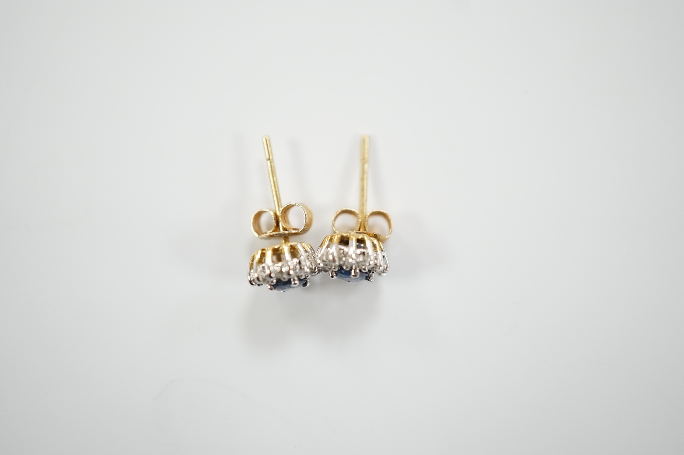 A pair of yellow metal, sapphire and diamond set oval cluster ear studs, 7mm, gross weight 1.3 - Image 4 of 4