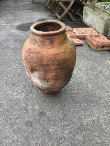 A terracotta amphora, height 54cm