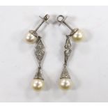 A pair of white metal, two stone cultured pearl and two stone diamond chip set drop earrings,