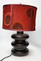 A pair of 1970's turned and ebonised wood table lamps, 57 cm high