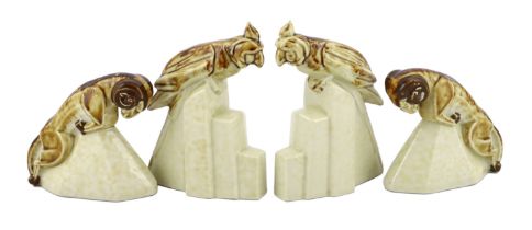 Camille Tharaud (French, b.1878), two pairs of Art Deco porcelain bookends, c.1925, modelled as a