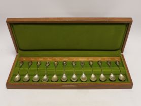 A modern cased set of twelve parcel gilt silver 'Royal Horticultural Society Flower Spoons' by