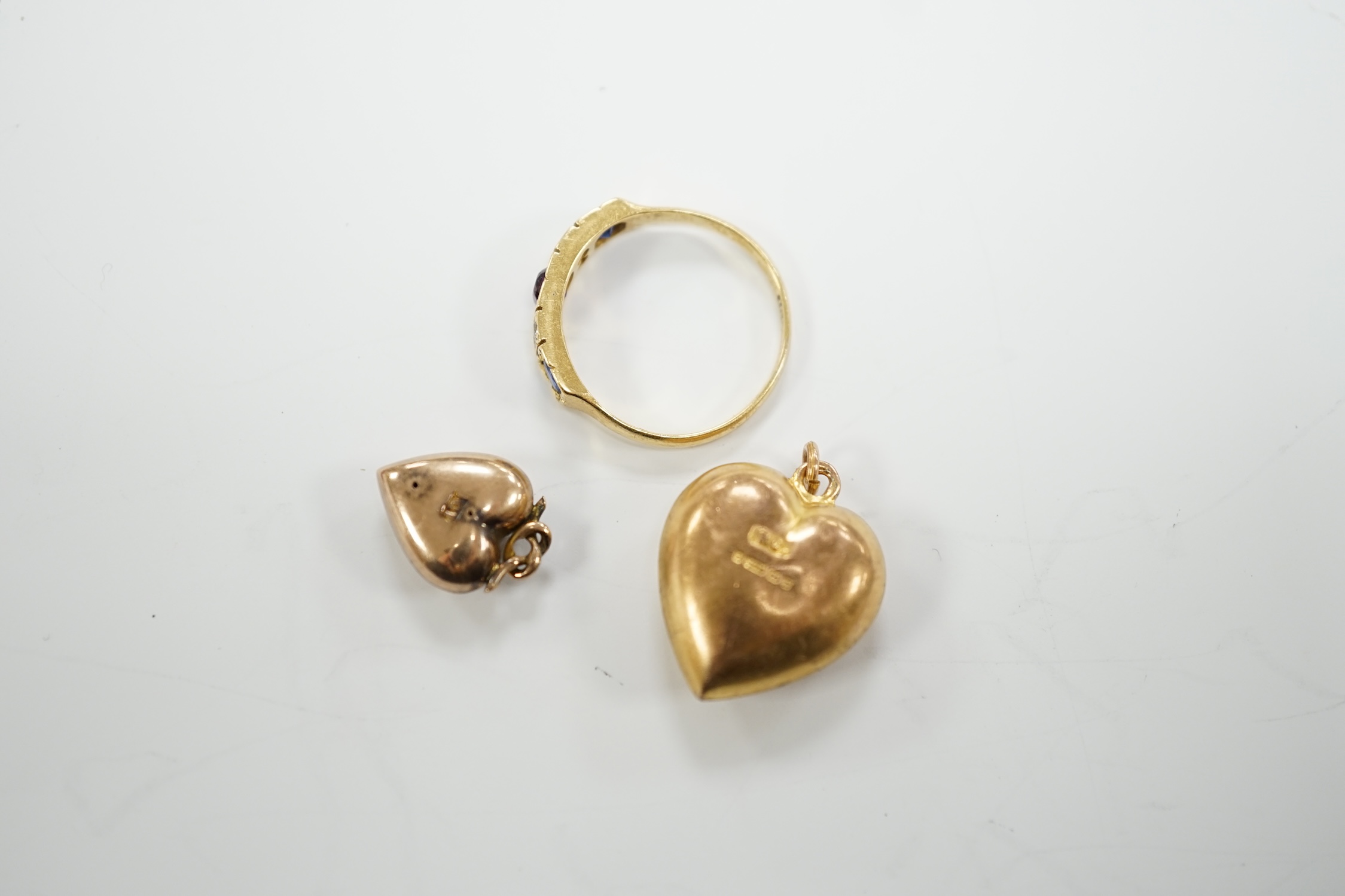 Two late Victorian 9ct and gem set heart pendants and an 18ct and gem set ring. - Image 6 of 9