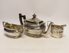 A George III engraved silver teapot and sugar bowl, by Andrew Fogelberg, London, 1805 and a