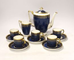 A Mintons powder blue part coffee set comprising six cans and saucers, coffee pot and milk jug