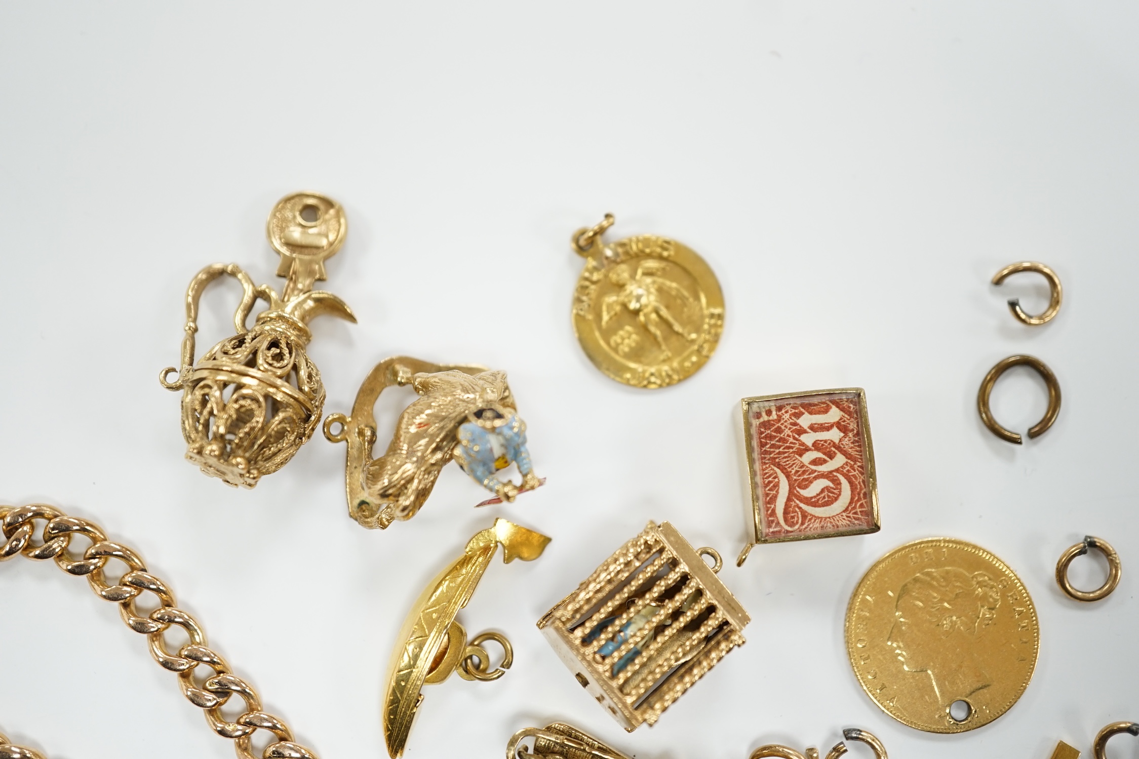 A 9ct gold curb link bracelet and eleven assorted mainly 9ct gold loose charms, gross weight 56.3 - Image 2 of 9