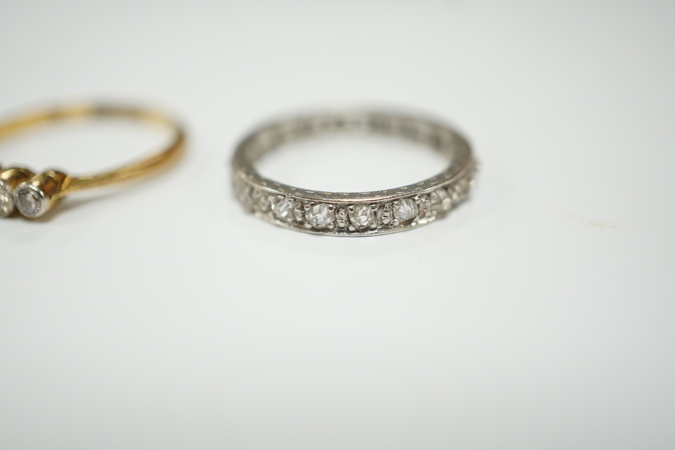 A white metal and diamond chip set full eternity ring and an 18ct and graduated five stone diamond - Image 4 of 7