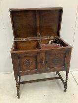 An early 20th century oak cased wind-up gramophone 'The Minstrel', width 74cm, depth 46cm, height