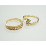 A modern 18ct gold and graduated seven stone diamond set half hoop ring, size O and a similar