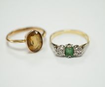 A 750, single stone emerald and two stone illusion set diamond ring and a 9ct and citrine set ring.