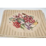 Four rectangular beige petite point floral cushion covers with corded edging