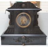 A large black slate mantel clock, with visible Brocot escapement, 45cm high