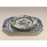 A Chinese blue and white meat plate and three plates, 18th century, meat plate 35cm wide