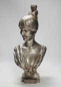 After Leiche, a polished spelter bust of ‘Rieuse’, 45cm