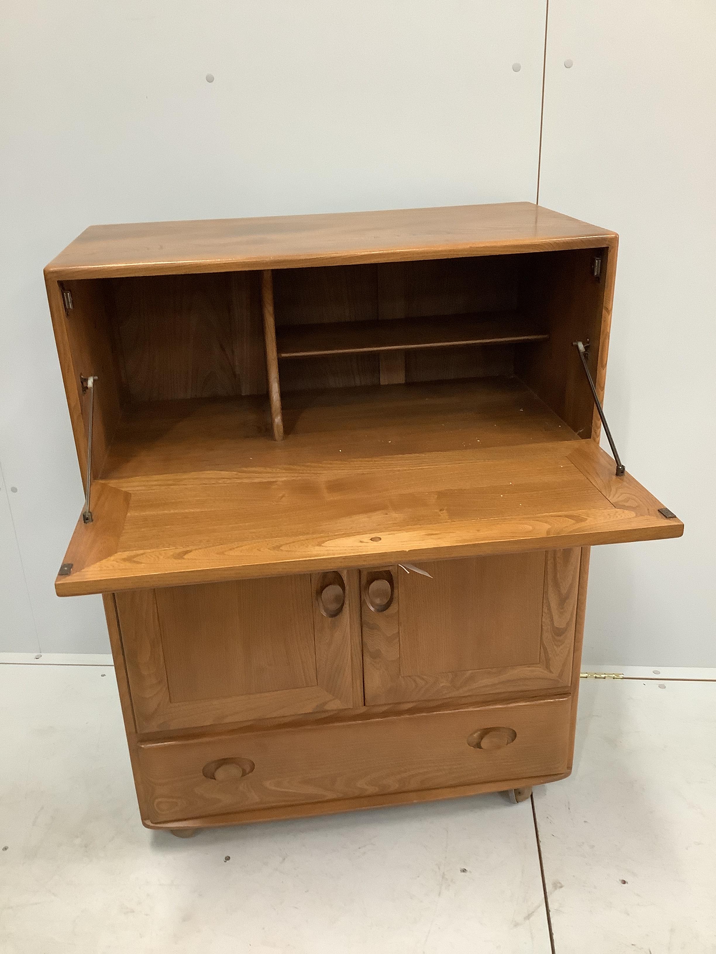 An Ercol elm bureau / cabinet, width 82cm, depth 44cm, height 109cm - Image 2 of 2