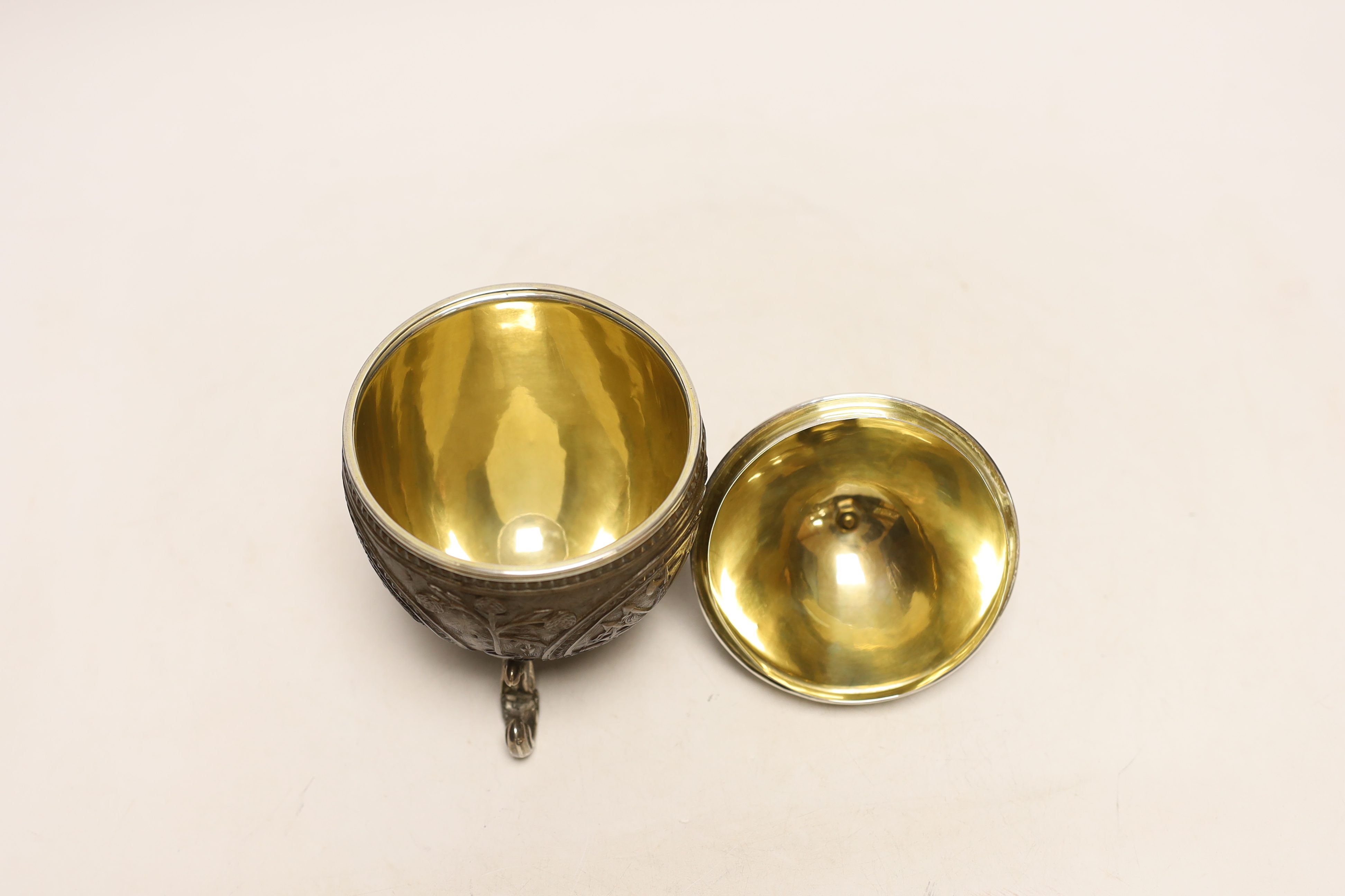 A unmarked white metal mounted coconut cup, on three scroll feet, height 17.4cm. - Image 3 of 3