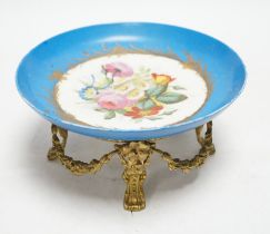 A Sevres style dish with ormolu mounted foot, 22cm diameter