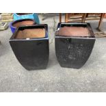A pair of large black glazed square earthenware garden planters, 43cm, height 59cm
