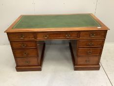 A late Victorian mahogany pedestal desk by Maple and Co., width 137cm, depth 74cm, height 74cm